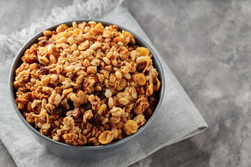 Nutty Granola Bowl on Concrete Background. Top View. Copy Space