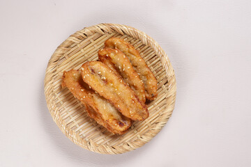 Kluay Kaek is Thai Banana Fritters with Sesame Seed, Popular Street Food. 