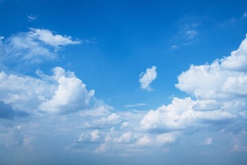 Bright blue sky with cumulus and cirrocumulus clouds, day 