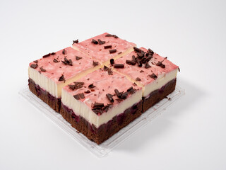 Cherry cake with chocolate on a white background. Cream cake with cherries and chocolate.