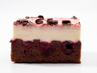Cherry cake with chocolate on a white background. Cream cake with cherries and chocolate.