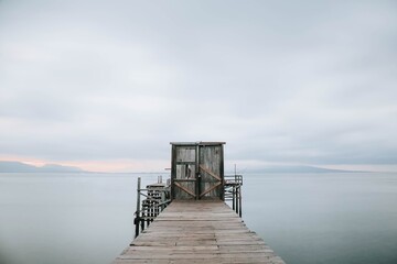 Old and traditional dock port made of wood during cloudy day. Fisheries and fisherman.