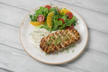 Chicken fillet with fresh salad. Healthy food, keto diet, diet lunch concept.