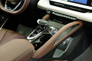 Modern luxury interior of car with leather seats big multimedia monitor dashboard and control panel...
