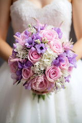 Naklejka premium Bridal bouquet: Bride is holding a beautiful flower bouquet, close-up view