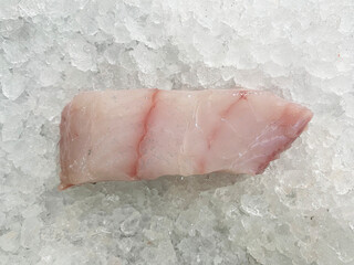fresh raw cold seafood grouper fillet cut grey whole fish ikan on white ice background halal food cuisine hyper market menu for restaurant ingredient design
