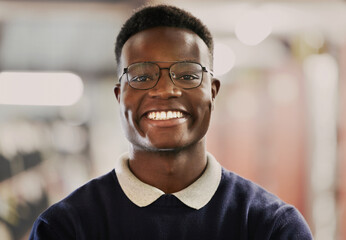 Student, university and portrait of black man for education, learning and excited for future career on campus. Face of African person in library with glasses for research, school project and studying