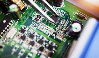 Motherboard, microchip and engineering closeup with electric maintenance of circuit board. Developer, IT and dashboard for electrical hardware update and technician tools for information technology - obrazy, fototapety, plakaty