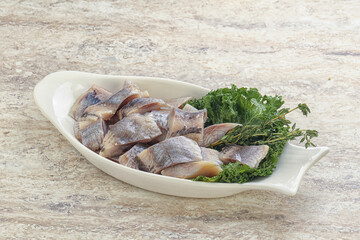 Herring fillet slice on the bowl