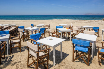 Fototapeta na wymiar Romantic restaurant on the beach in the resort town of Mastichari on the island of Kos. Greece