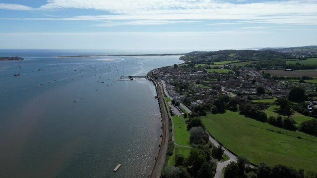 Starcross, River Exe, South Devon, England: DRONE VIEWS: River Exe and its mouth, Starcross village and the railway line. Starcross harbour is a crossing to the popular UK holiday resort of Exmouth.