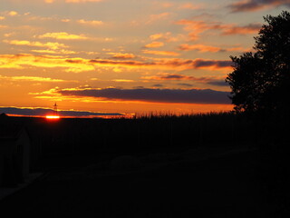 Golden yellow and orange sunset in the mountains