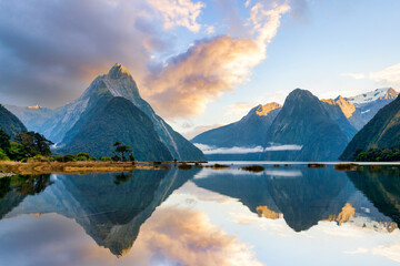 Milford Sound, one of New Zealand's most famous landscapes, at sunrise.