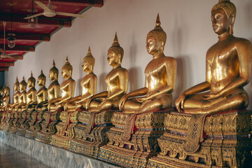 Gold Buddha statue inside a temple