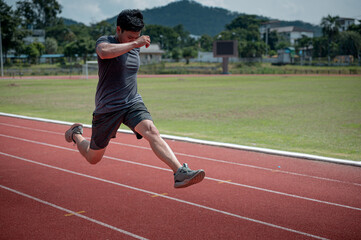 Fototapeta premium Fit athlete men do running exercise physical workout routine in sportswear with power confidence training at race track stadium for healthy lifestyle preparing practicing marathon jogging competition