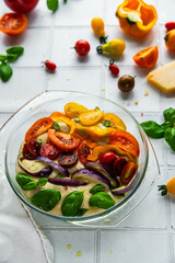 Homemade rainbow focaccia bread. Step by step process of making colorful vegetable focaccia.