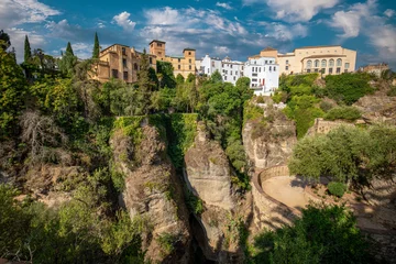 Fotobehang Ronda Puente Nuevo Generic view of the city of Ronda, Malaga, Spain, from one of its viewpoints, with the Tajo de Ronda in the foreground