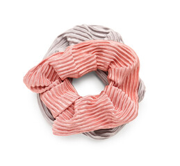 Two stylish scrunchies on white background