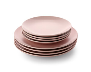Stack of pink plates on white background