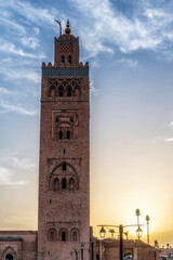 Obraz premium Koutoubia Mosque Tower in Marrakech at sunset, Morocco, blue sky background