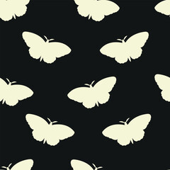 Seamless pattern of silhouettes of yellow butterflies on a black background.