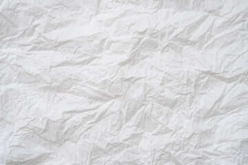 Naklejka premium Wrinkled or crumpled white stencil paper or tissue after use in toilet or restroom with large copy space used for background texture in decorative art work.