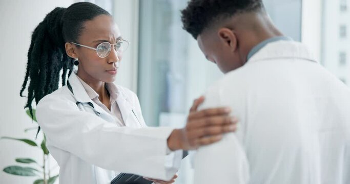 Empathy, healthcare and team of doctors in the hospital with stress, depression or sadness. Professional, support and African female medical worker comforting friend for mistake or crisis in a clinic