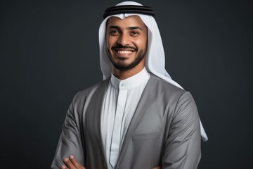 Obraz premium portrait of young businessman from arab in smile or happy expression on studio shoot grey background