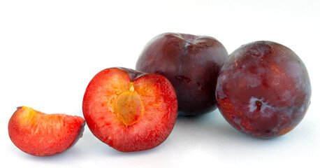 a few plum  on white background