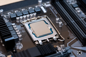 Modern CPU processor installed on a brand new motherboard, object detail, extreme closeup, nobody....