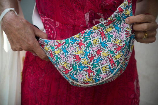 Strasbourg - France - 26 August 2023  - Closeup of Keith Haring hand bag in the street