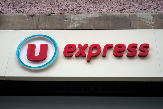 Strasbourg - France - 26 August 2023  - Closeup of U express signage on store front in the street