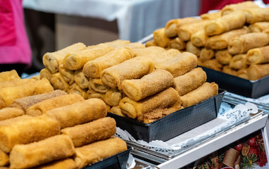 A heap of traditional Polish meat croquettes on a traditional festive market stall, detail shot,...