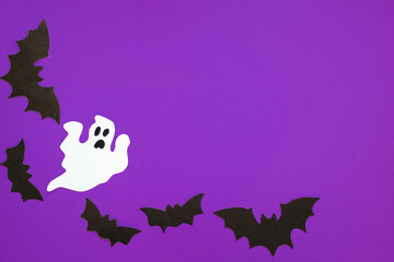 Paper bats on a purple background, Halloween concept