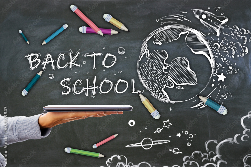 Poster close up of female hand holding tablet with abstract back to school sketch with pencils and rocket o