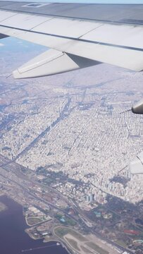 aerial view from the porthole of commercial plane to the city of Buenos Aires Argentina