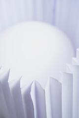 Obraz premium Zig Zag Folded paper with white orb glowing high key