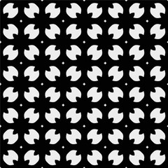 White background with black pattern. Seamless texture for fashion, textile design,  on wall paper, wrapping paper, fabrics and home decor. Simple repeat pattern.
