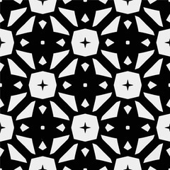 White background with black pattern. Seamless texture for fashion, textile design,  on wall paper, wrapping paper, fabrics and home decor. Simple repeat pattern.
