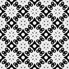 White background with black pattern. Seamless texture for fashion, textile design,  on wall paper, wrapping paper, fabrics and home decor. Simple repeat pattern.
