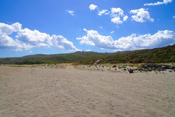 Fototapeta na wymiar view from the beach Playa de la Hacienda near La Alcaidesa to the green Andalusien hills, Malaga, Cadiz, Spain