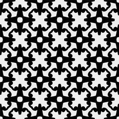 White background with black pattern. Seamless texture for fashion, textile design,  on wall paper, wrapping paper, fabrics and home decor. Simple repeat pattern.
