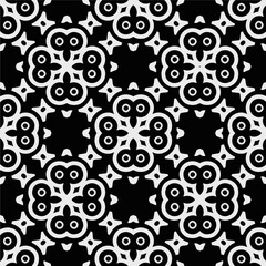 White background with black pattern. Seamless texture for fashion, textile design,  on wall paper, wrapping paper, fabrics and home decor. Simple repeat pattern.