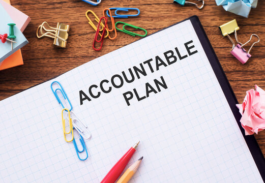 Business concept. Paper notepad with text ACCOUNTABLE PLAN on office table