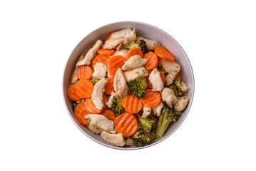 Delicious dish consisting of pieces of boiled chicken, broccoli and carrots