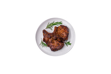 Delicious beef or pork steak on the bone grilled with spices and rosemary