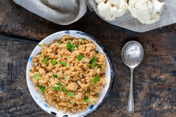 Spiced cauliflower rice with fresh coriander - overhead view