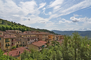 Fototapeta na wymiar Cortona, panorama della città vecchia verso il Lago Trasimeno - Arezzo