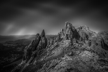 Black and white dolomite rocky scene with innumerable spiers in the Latemar Massif, UNESCO world...