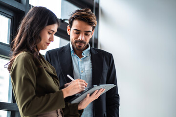Male mature caucasian ceo businessman leader with diverse coworkers team executive managers group meeting. Multicultural professional businesspeople working together on research plan boardroom.